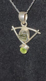 Chunk of Moldavite and Faceted peridot crystal pendant