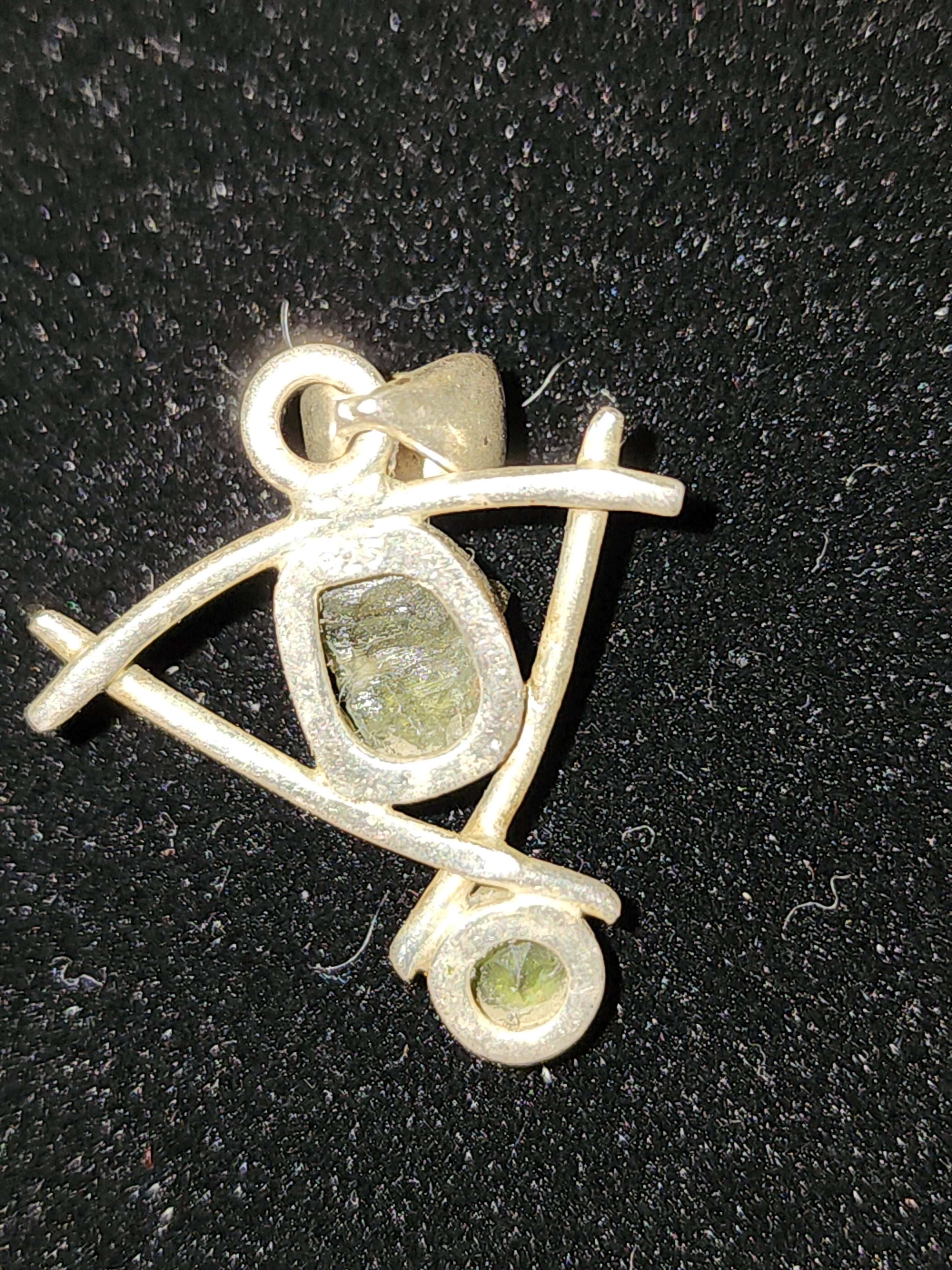 Chunk of Moldavite and Faceted peridot crystal pendant