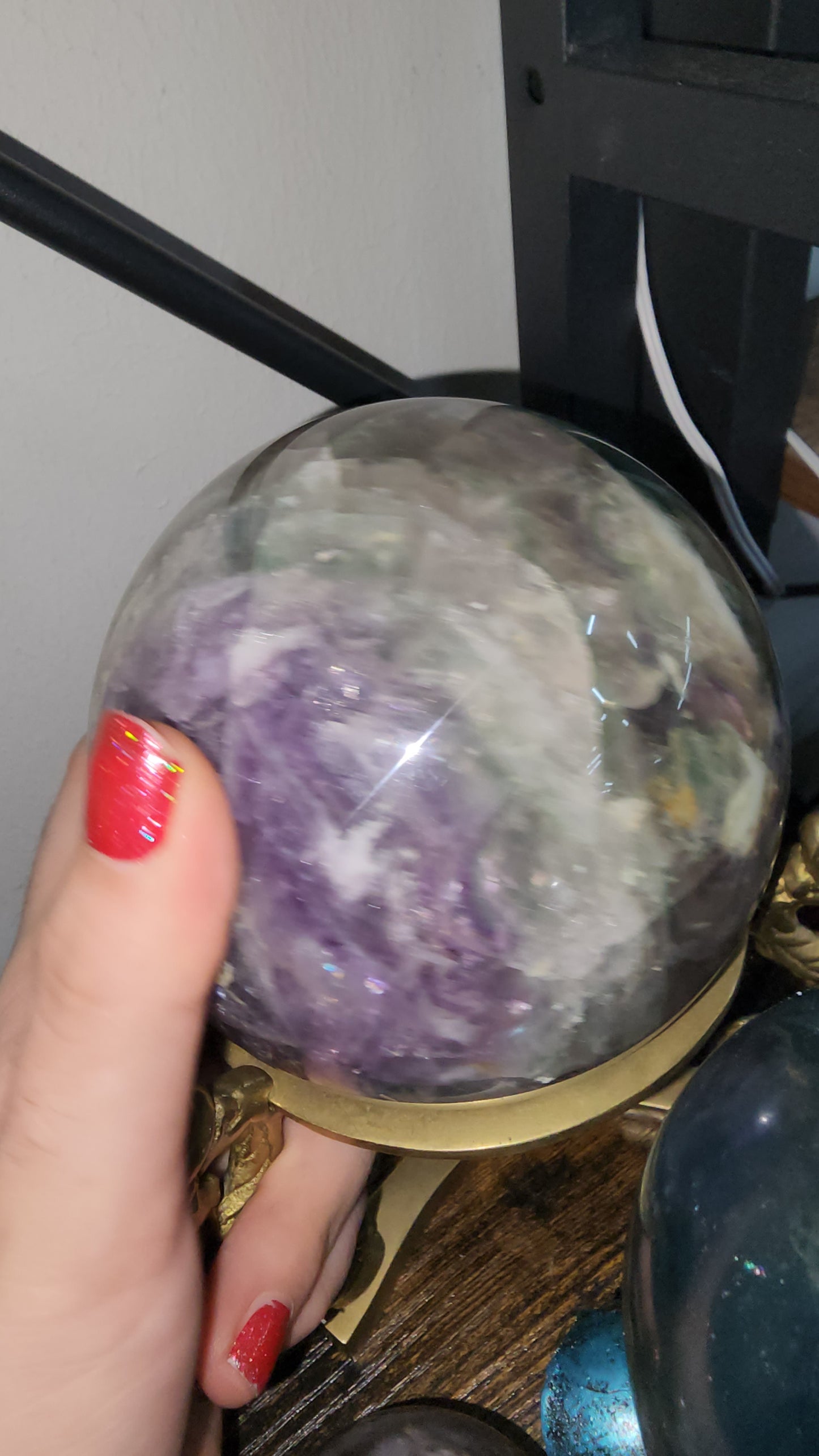 Big rainbow fluorite crystal sphere