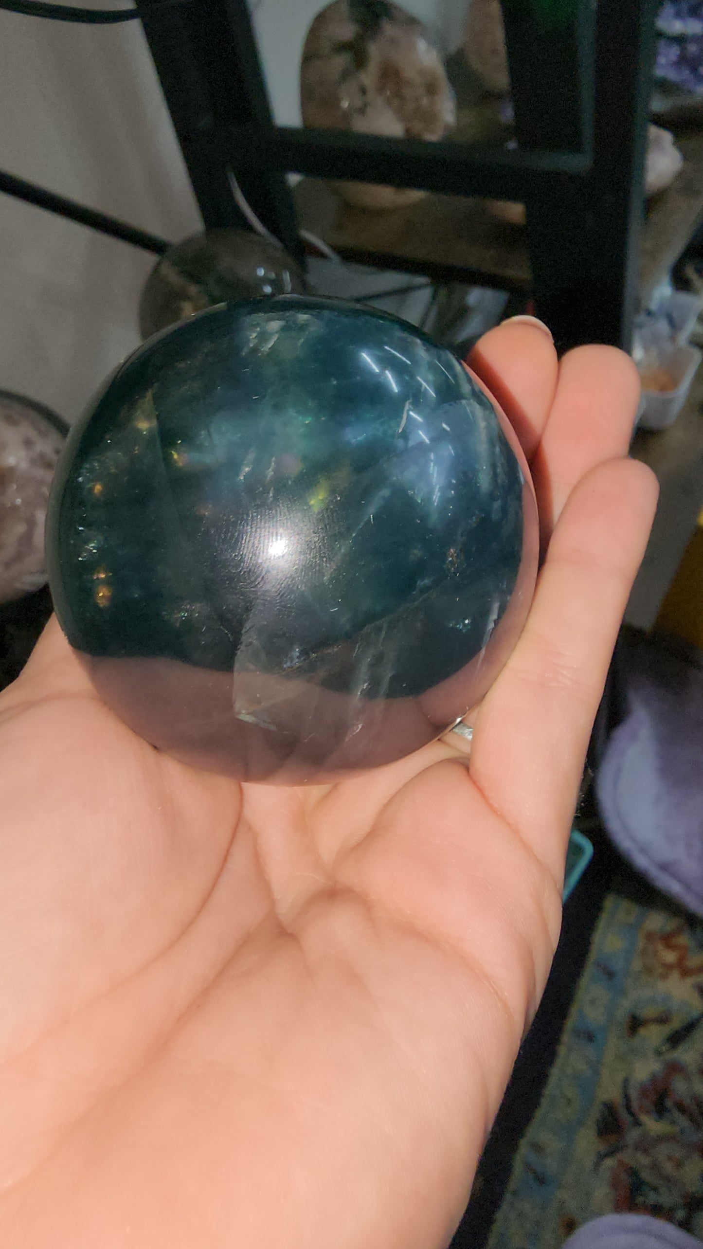 Blue fluorite crystal sphere many crazy rainbows