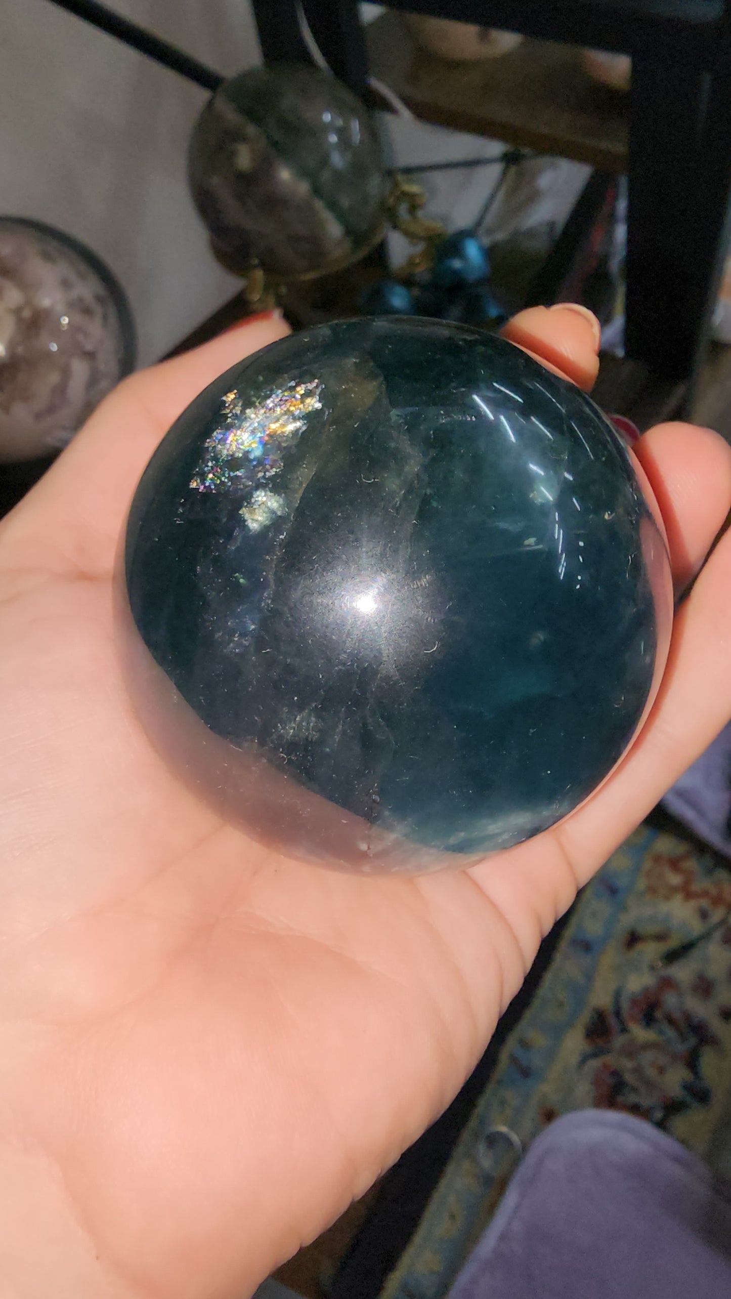 Blue fluorite crystal sphere many crazy rainbows