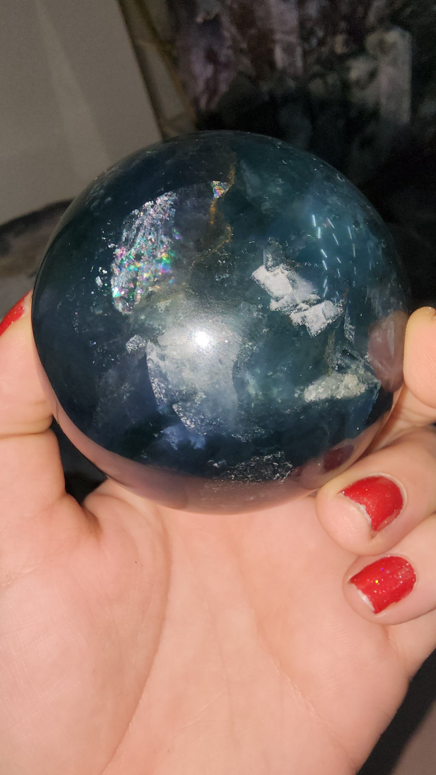 Blue fluorite crystal sphere many crazy rainbows