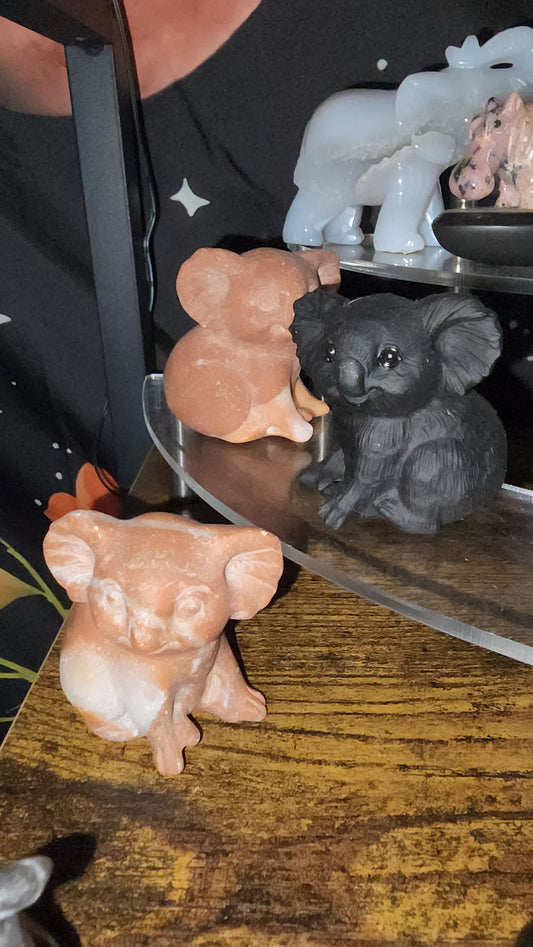 Obsidian Koala bear crystal carvings.