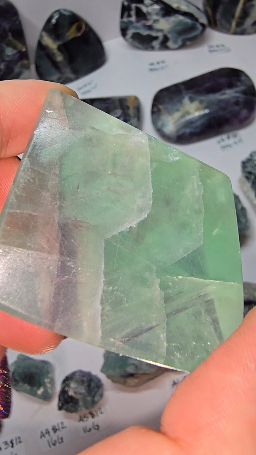 Polished fluorite freeforms multiple sides