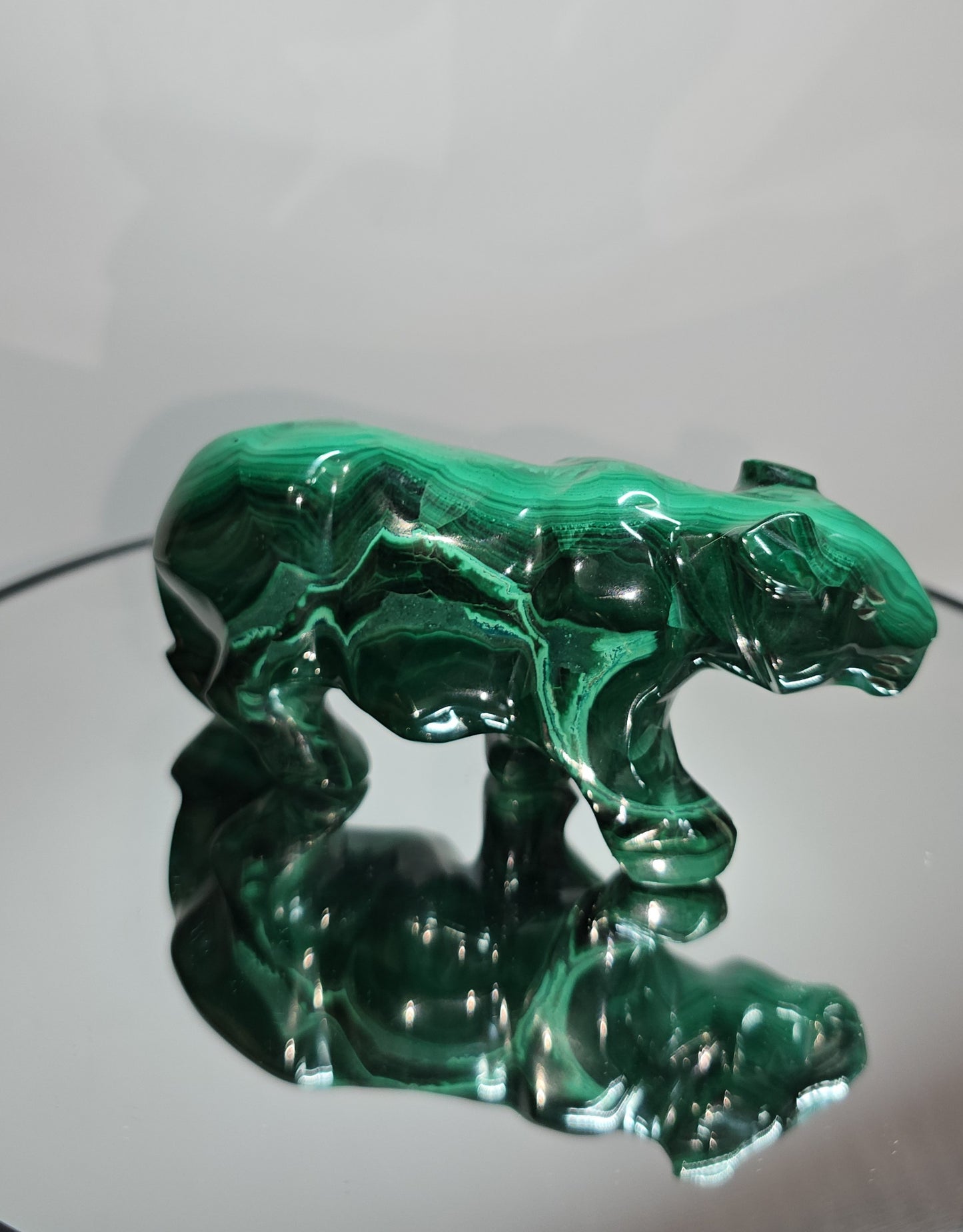 Handcarved Malachite lionesses