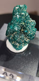 Dioptase raw specimens on acrylic stands